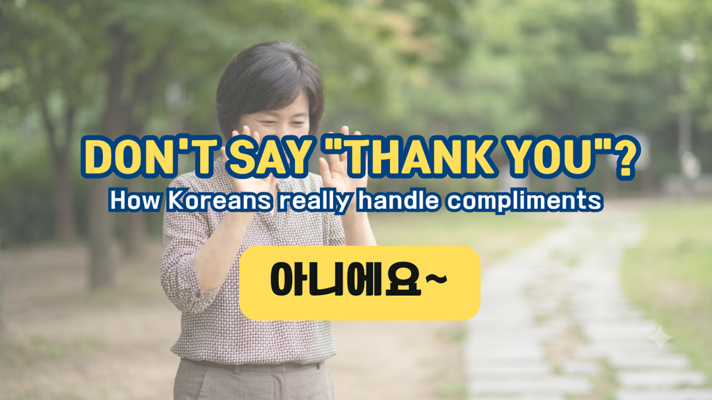 person modestly waving off a compliment in Korea